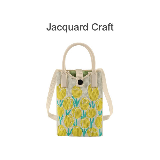 A knitted phone crossbody bag featuring a floral design in yellow and green, with a cream handle and a logo.