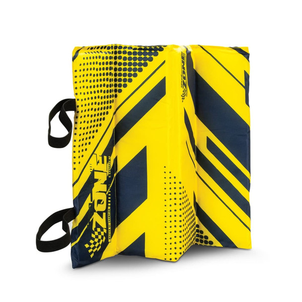 A foldable stadium cushion in bright yellow and navy, featuring a bold geometric design and carrying straps.