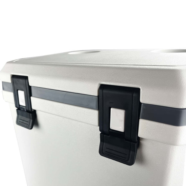 A cooler box with a grey exterior featuring black latches and a sleek design. It includes a branding logo.