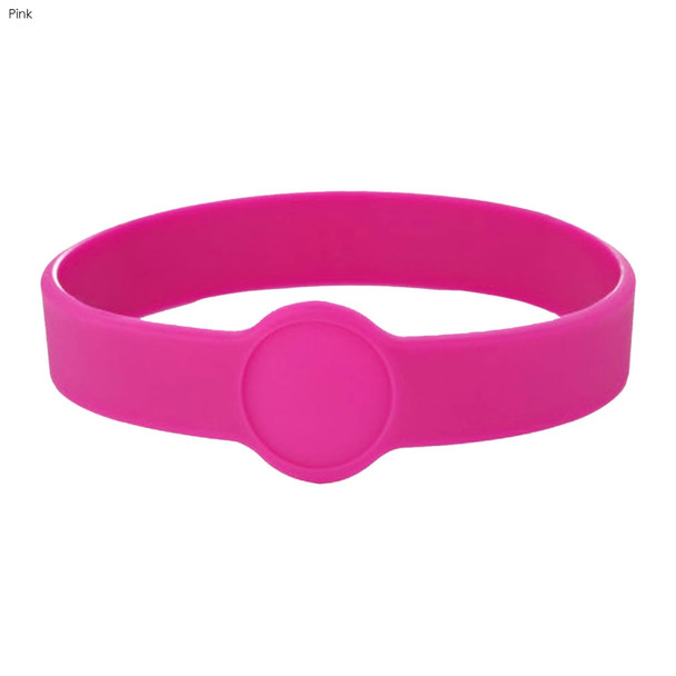 A pink silicone wristband with a central circular section, suitable for custom designs. Features a logo.