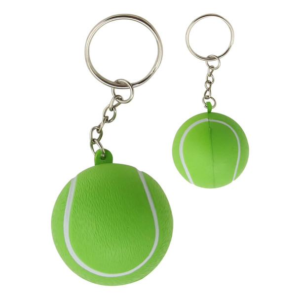 A green tennis ball key ring, featuring a textured surface and white markings, attached to a metal keychain.