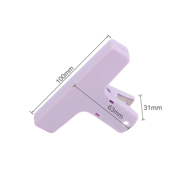 A purple plastic clip with dimensions of 100mm x 63mm x 31mm, featuring a metal clasp.