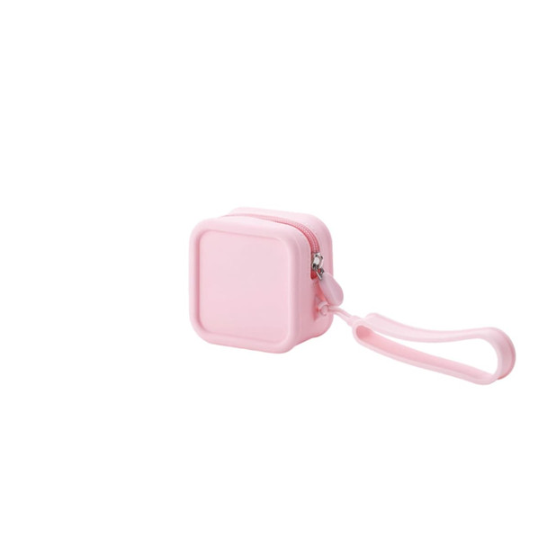 A pink square silicone coin pouch with a zip closure and a wrist strap for easy carrying.