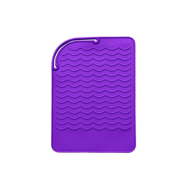 A purple silicone hair straightener pad with a textured wave design and a hanging loop.