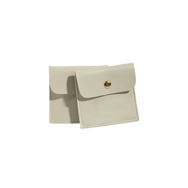 A square, light grey PU leather jewelry pouch with a gold button closure. Features branding on the surface.