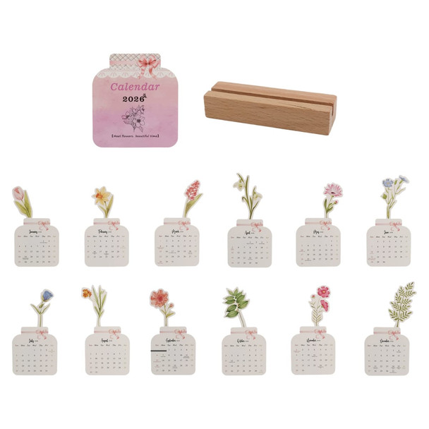A floral-themed desk calendar for 2026 with a wooden stand. Features various flowers and pastel colours.
