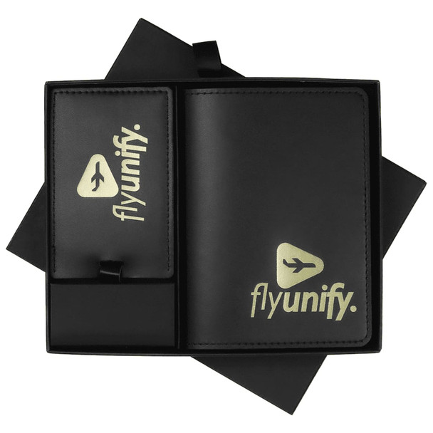 A black leather travel gift set featuring a wallet and luggage tag, both with a logo.