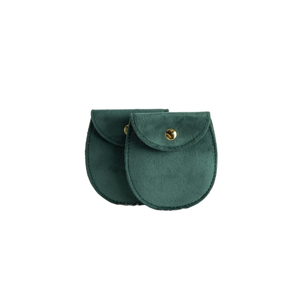 A pair of oval velvet jewelry pouches in dark green, featuring a button closure and a stitched edge.