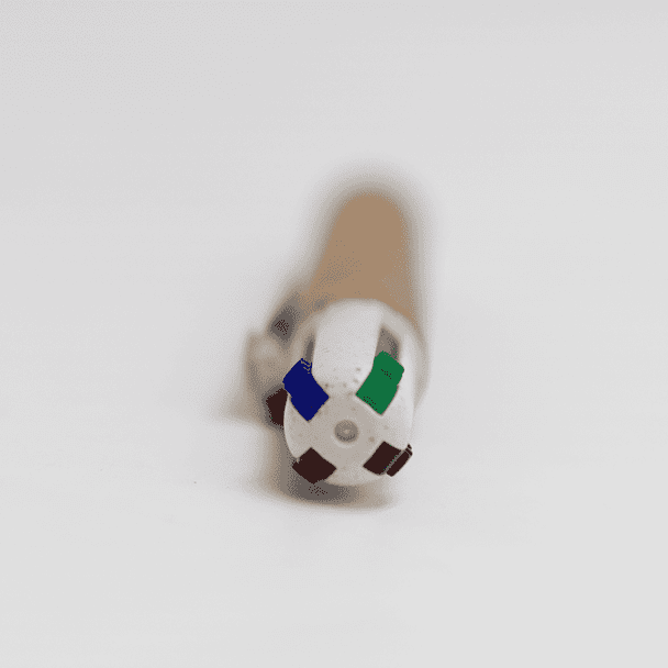 A cork pen with four colour options: blue, green, black, and red, featuring a branded design on the cap.