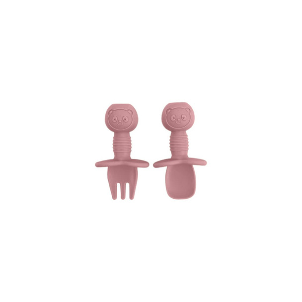 Two pieces of pink silicone cutlery for kids, featuring bear-shaped handles with smiling faces.
