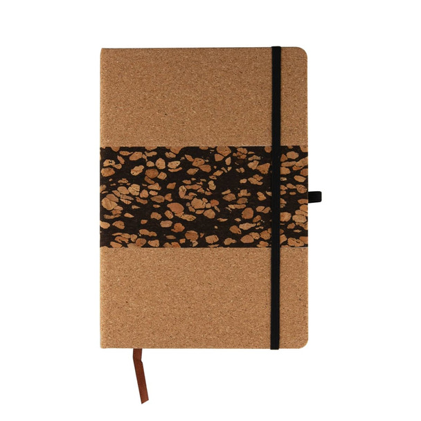 A notebook with a cork cover and a decorative band featuring coffee grounds patterns, secured with a black elastic.