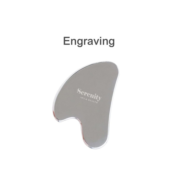 A stainless steel Gua Sha massage tool with a shiny silver finish and a unique, curved shape. It features a logo engraving.