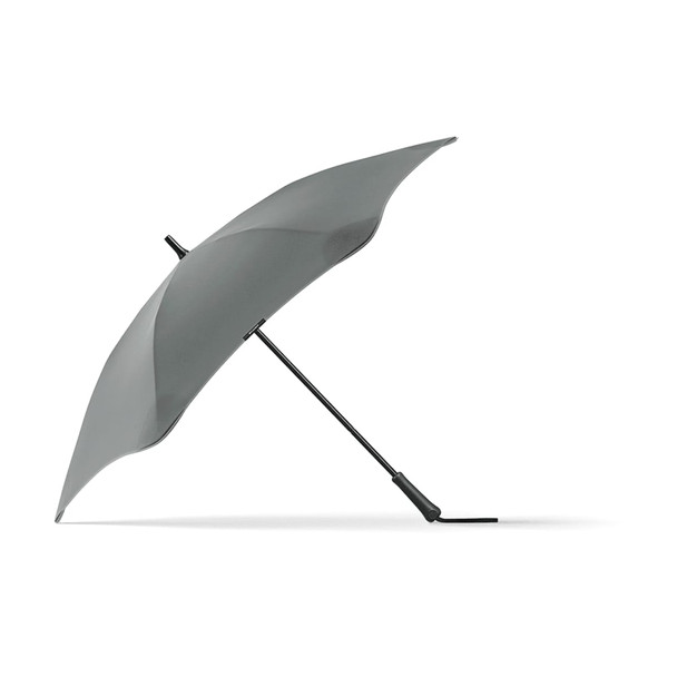 A grey BLUNT Classic Umbrella with a unique, aerodynamic shape and a curved canopy, featuring a logo on the handle.