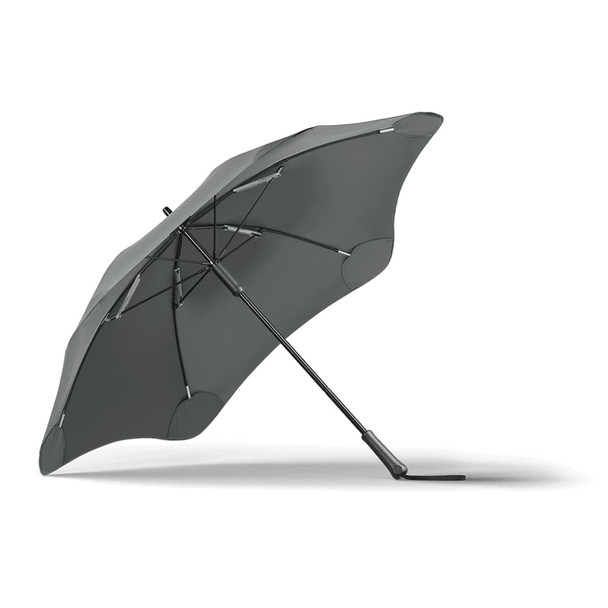 A grey BLUNT Classic Umbrella with a sleek design and a sturdy base, featuring a logo on the handle.