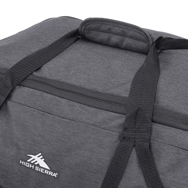 A dark grey duffel bag with sturdy black straps and a logo on the side.