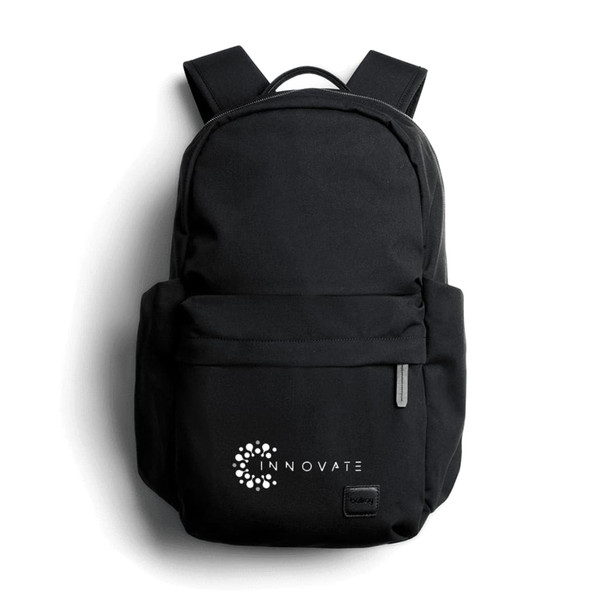 A black backpack with a logo on the front, featuring adjustable shoulder straps and a zippered pocket.