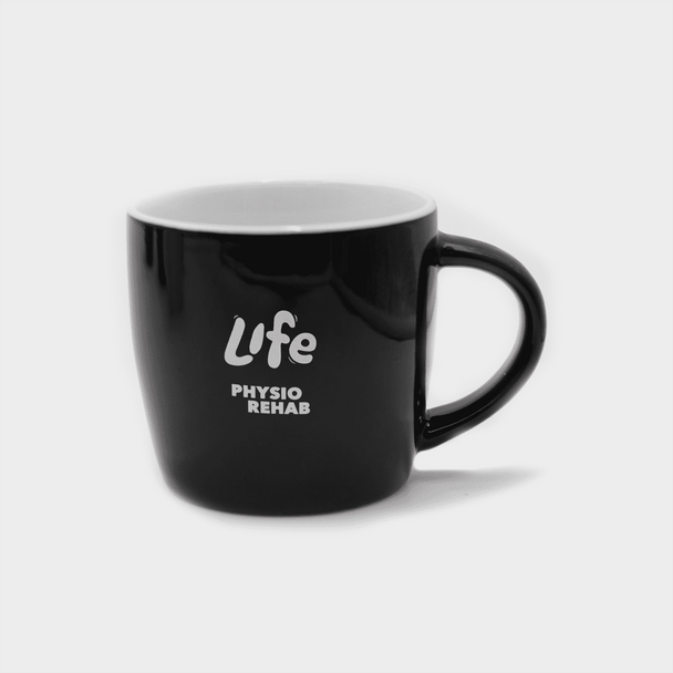 A black ceramic mug with a curved design and a handle, featuring a logo on the front.