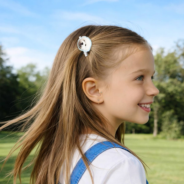 A custom-shaped acrylic hair clip in white, worn in a girl's hair outdoors, with a smiling expression and natural background.