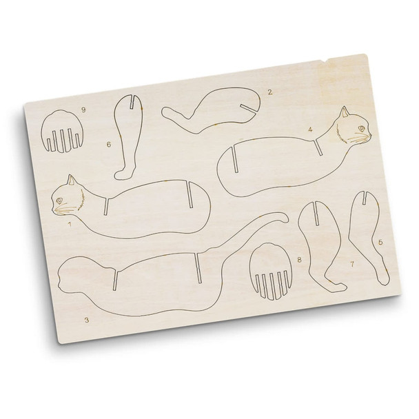 A wooden model kit featuring various cat shapes, labelled parts, and a light wood finish. Includes a branding logo.