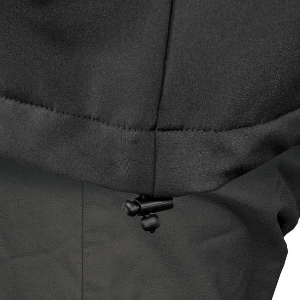 A close-up of the hem and adjustment toggle of a black soft shell men's jacket. The fabric texture is visible.