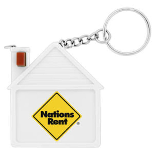 A white house-shaped keychain with a silver chain, featuring a logo on the front.