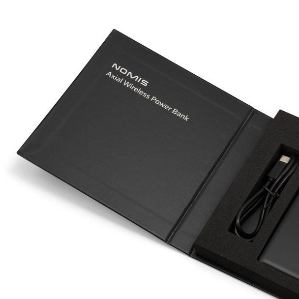 A black power bank housed in a sleek box, featuring a USB cable and branding.