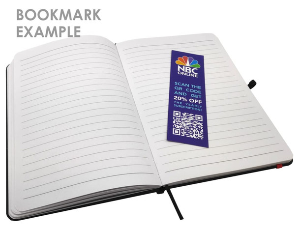 A notepad with blank lined pages and a bookmark inserted, featuring a design with various colours and a logo.
