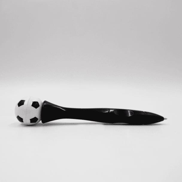 A black pen with a soccer ball design on top, featuring a glossy finish and a click mechanism.