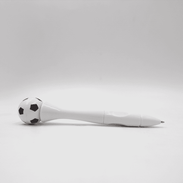A white pen with a black and white soccer ball-shaped top and a logo on the body.