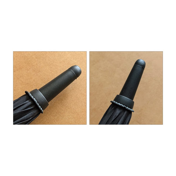 A black umbrella tip with a black plastic cap, featuring a textured grip and a small decorative band.