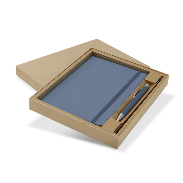 A blue notebook and pen set, presented in a brown kraft box. The set includes a matching pen.