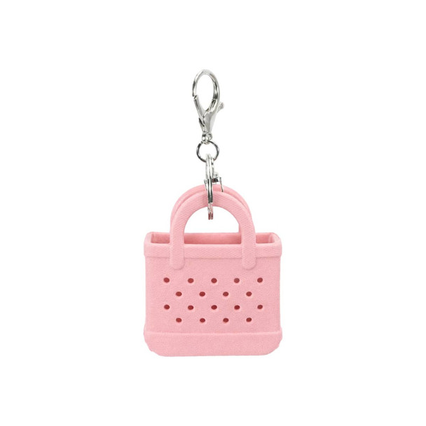 A pink Mini EVA holes bag keychain with a silver clip, featuring a perforated design.