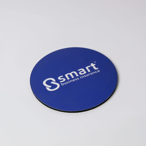 A round, blue coaster with a black underside and a white branding logo.