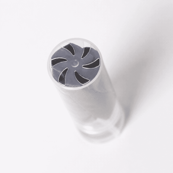 A lens cleaner with a clear casing and grey cleaning tip, designed for cleaning eyeglasses and screens.