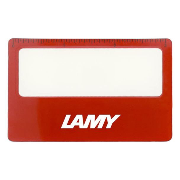 A red pocket ruler magnifier with a clear centre and a branding logo on the front.