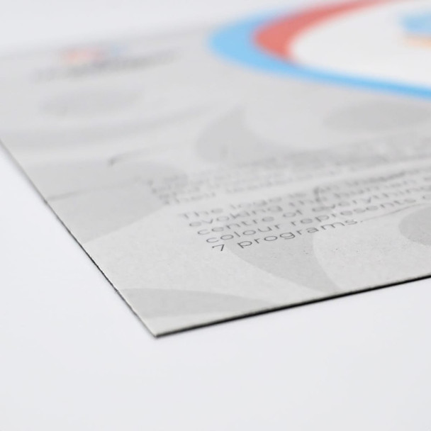 A magnetic jigsaw puzzle, featuring a colourful design with blue, red, and grey elements, showcasing a logo.