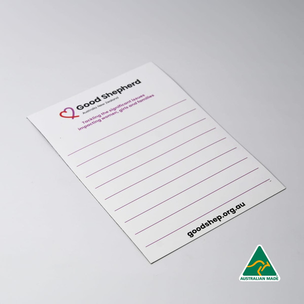 A white magnetic whiteboard featuring lined sections and a logo in the corner. It has a smooth, glossy finish.