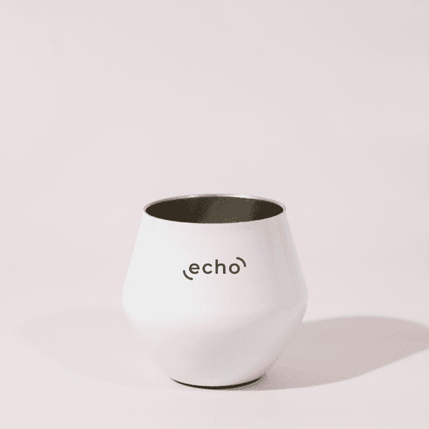 A white, detachable wine glass with a sleek design and a logo on the front.