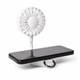 A white rechargeable fan attached to a phone stand, displaying a black smartphone. The fan features a flexible neck.