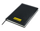 A black A5 notebook with a textured cover and a ribbon marker, featuring a logo on the front.
