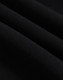 A close-up of black polar fleece fabric, showcasing its soft texture and layering. The image features a logo.