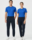 Two models wearing blue t-shirts and black poly/cotton terry sweat pants, standing side by side against a light background.