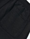 A close-up view of a black poly/cotton terry sweat pant, highlighting a back pocket detail.