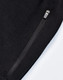 A pair of black poly/cotton terry sweat pants featuring a zip pocket and a soft texture.