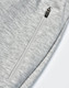 A pair of light grey poly/cotton terry sweat pants featuring a zip pocket.