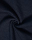 A close-up of dark navy fabric with a smooth, soft texture, showcasing a poly/cotton blend.