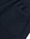 A dark grey pair of poly/cotton terry sweat pants featuring a back pocket. The fabric is soft and textured.
