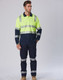A long-sleeve safety polo in high visibility yellow and navy, featuring reflective stripes and a logo.