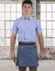 A denim half apron with a brown waistband, worn by a person in a blue checked shirt, against a city skyline backdrop.