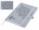 A grey A5 notebook with debossed text and a ribbon bookmark, featuring a logo on the cover.